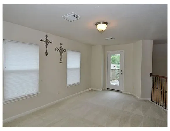 a view of a livingroom with a staircase