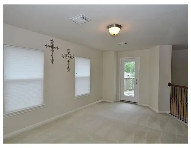 a view of a livingroom with a staircase