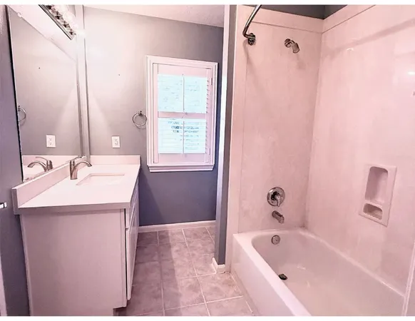 a view of a bedroom from a hallway