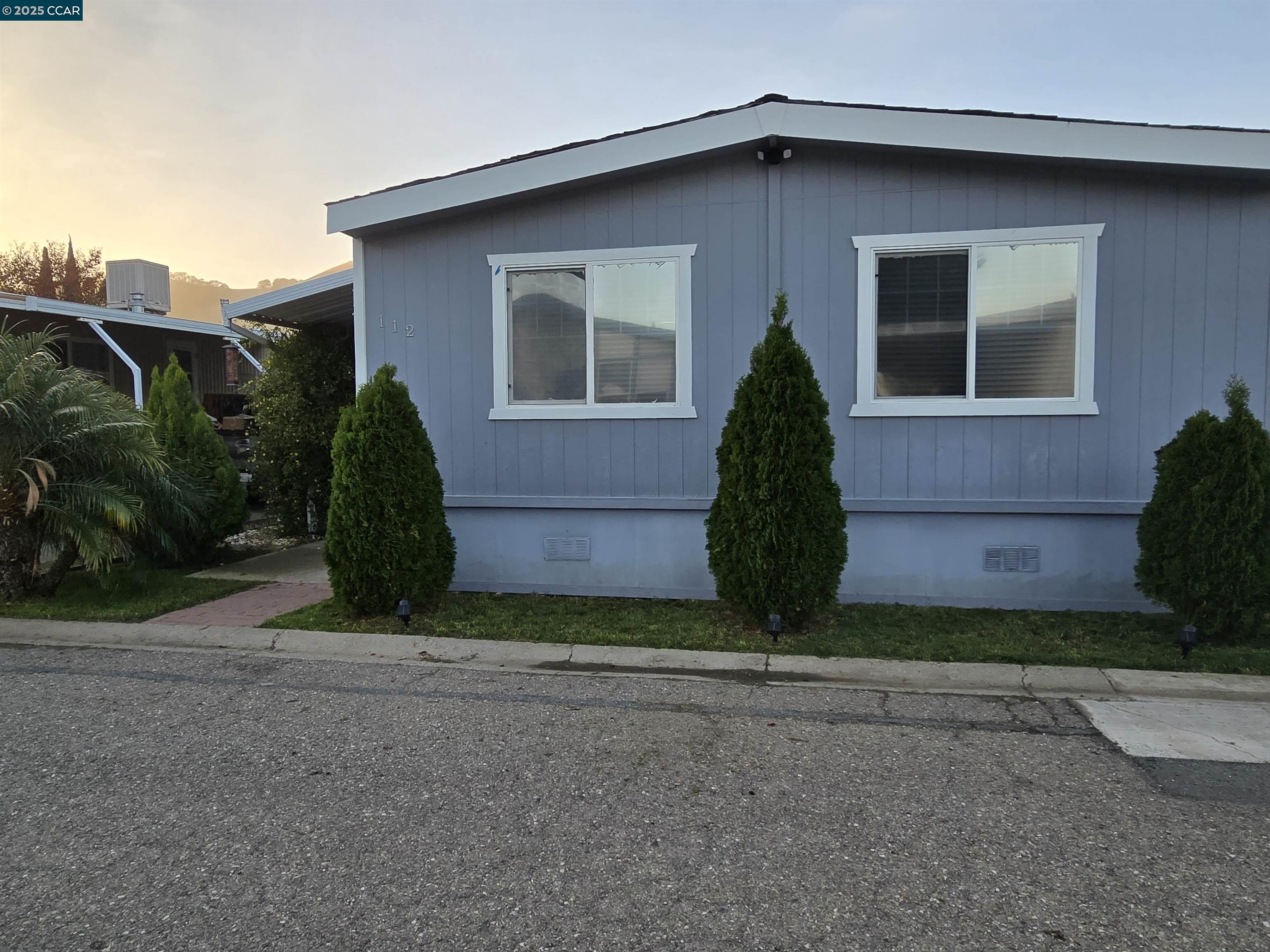 16711 Marsh Creek Road, Unit 112 Clayton, CA 94517 - Photo 1 of 30 a view of a house with street