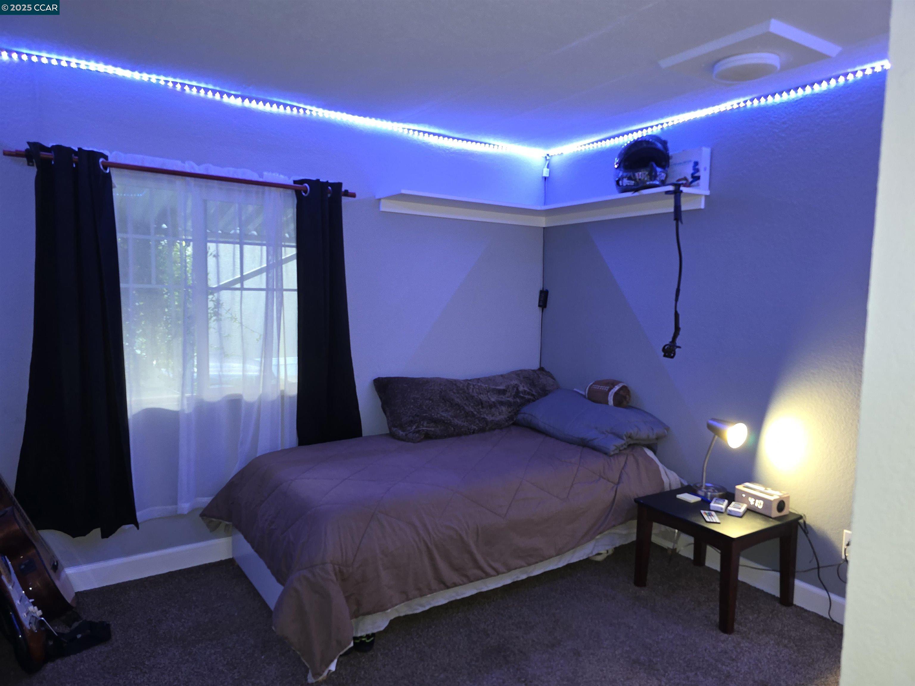 16711 Marsh Creek Road, Unit 112 Clayton, CA 94517 - Photo 20 of 30 a bedroom with a bed and a window