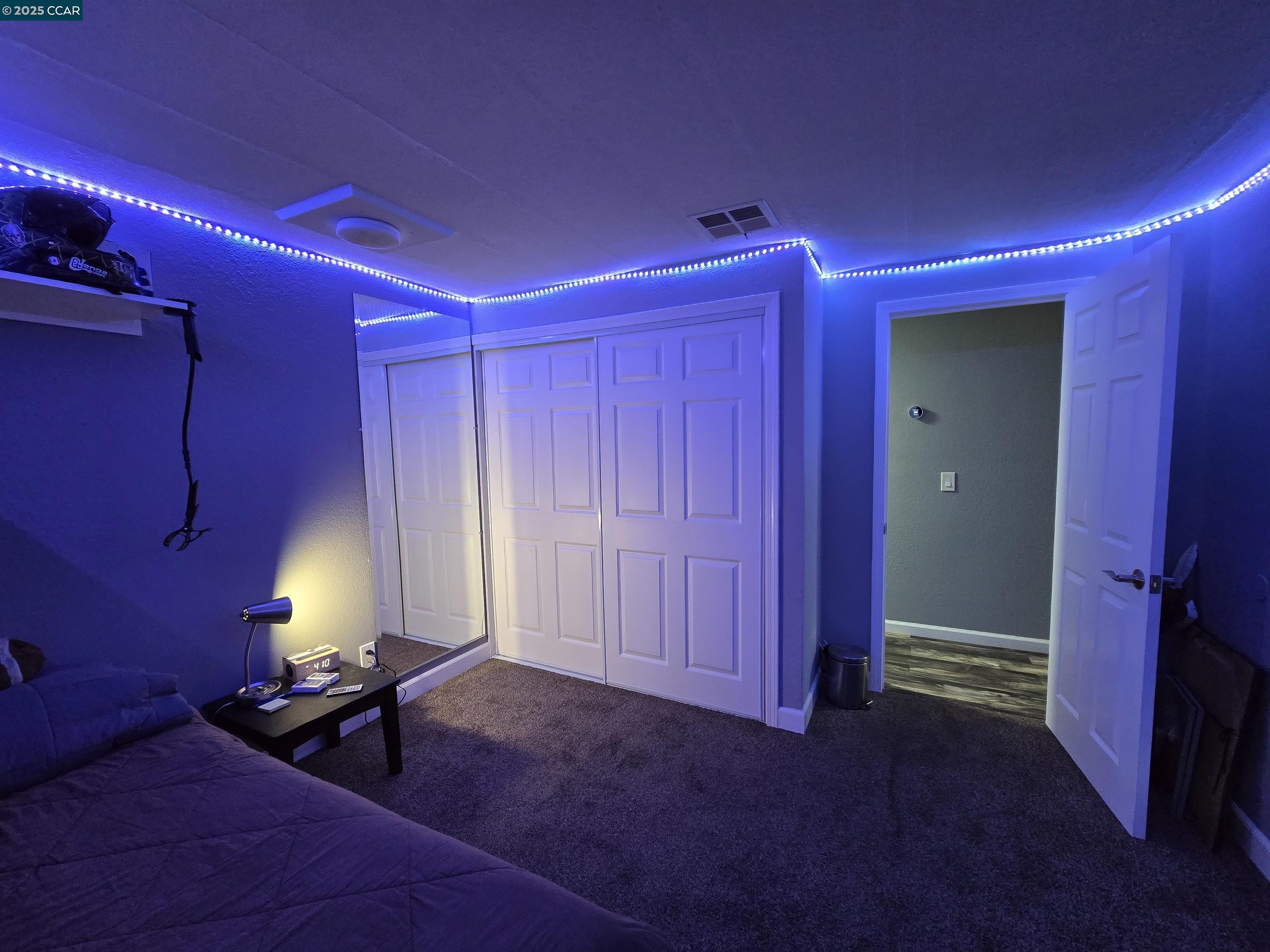 16711 Marsh Creek Road, Unit 112 Clayton, CA 94517 - Photo 22 of 30 a room with furniture and lamp