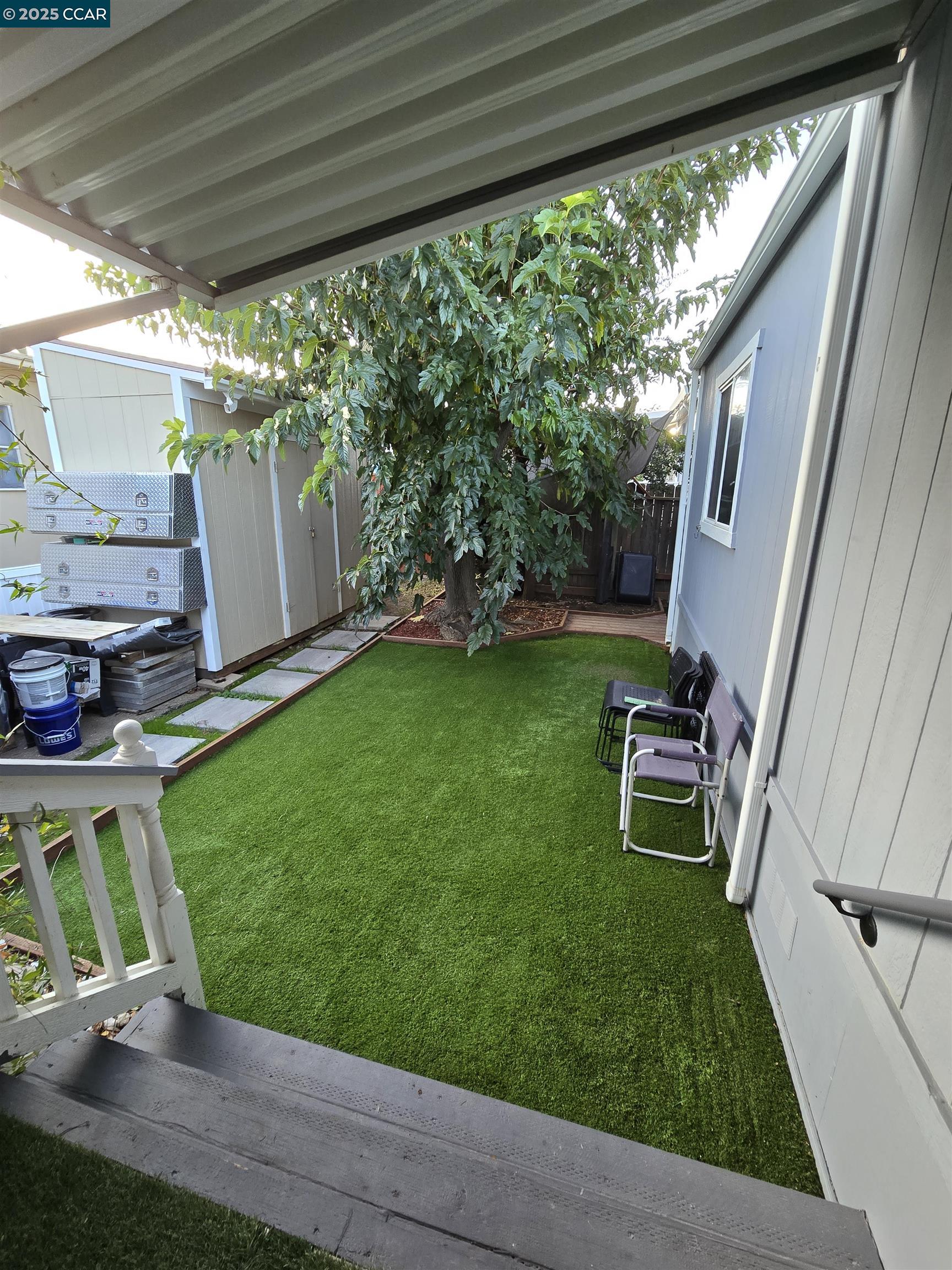 16711 Marsh Creek Road, Unit 112 Clayton, CA 94517 - Photo 30 of 30 a view of backyard with a table and chair