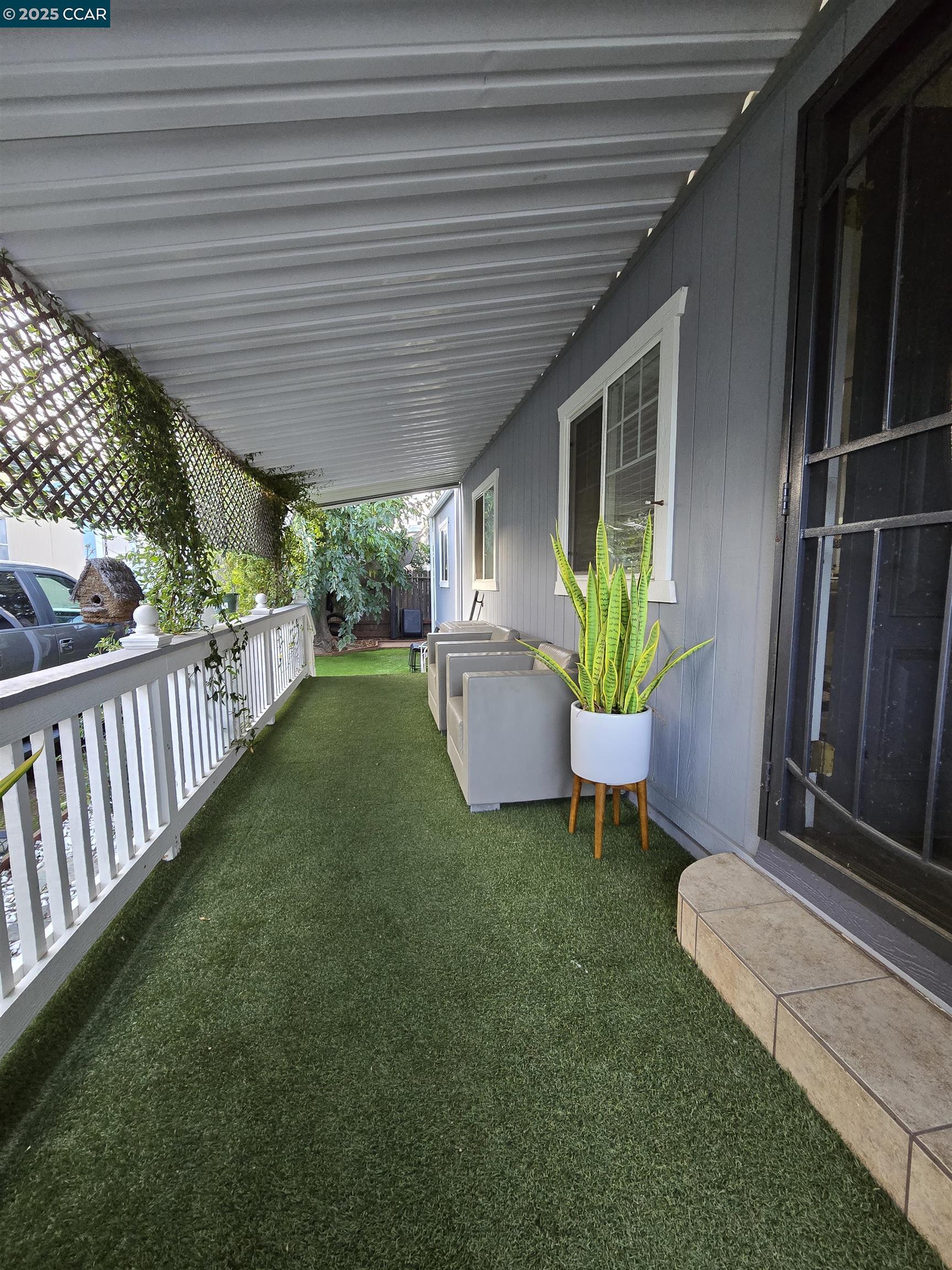 16711 Marsh Creek Road, Unit 112 Clayton, CA 94517 - Photo 8 of 30 a view of a chair and table in the patio