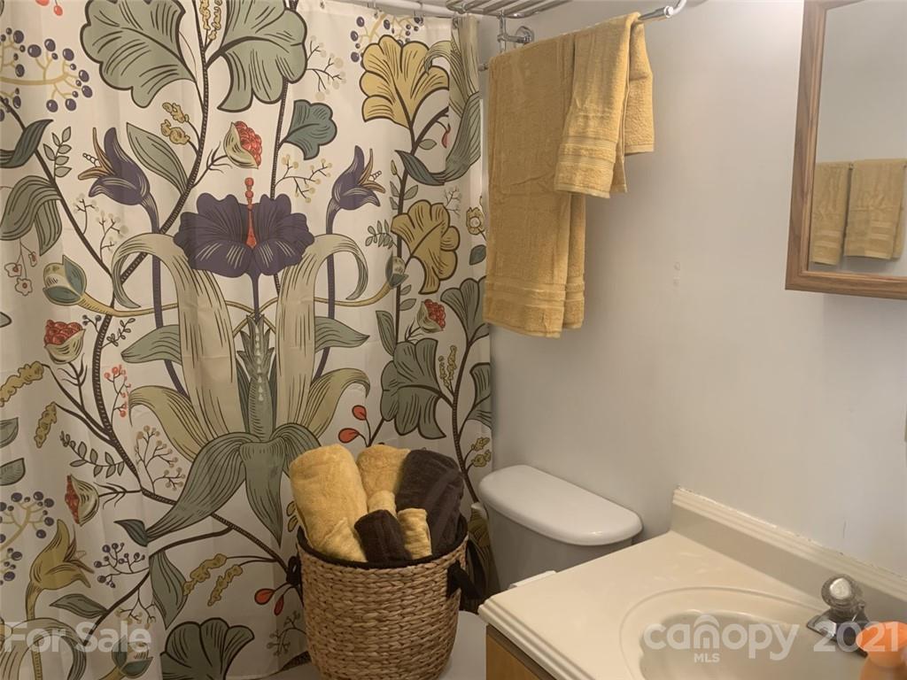 1822 Sharon Road York, SC 29745 - Photo 13 of 39 a bathroom with a toilet and a sink