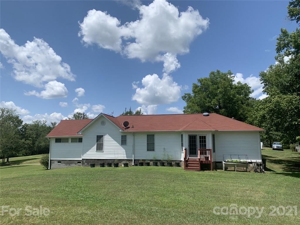 1822 Sharon Road York, SC 29745 - Photo 3 of 39 a front view of a house with a garden