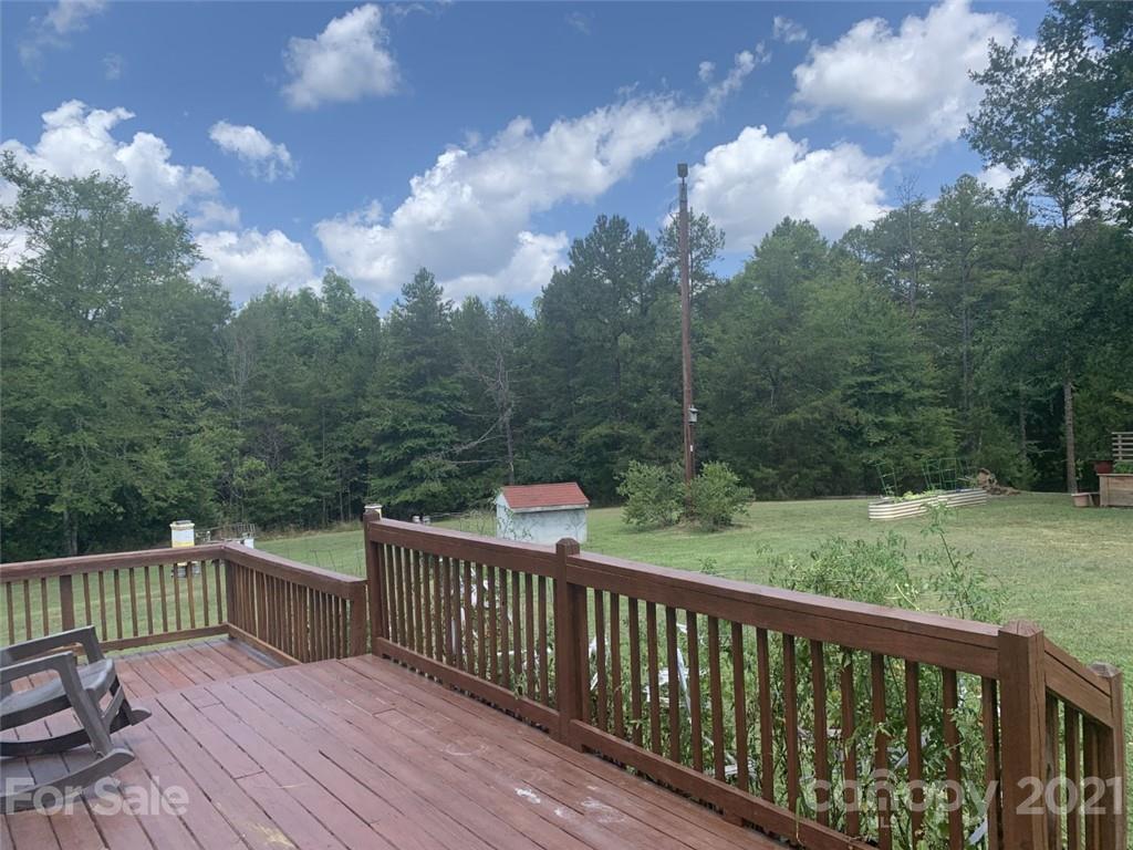 1822 Sharon Road York, SC 29745 - Photo 21 of 39 a view of a two chairs and table in the roof deck