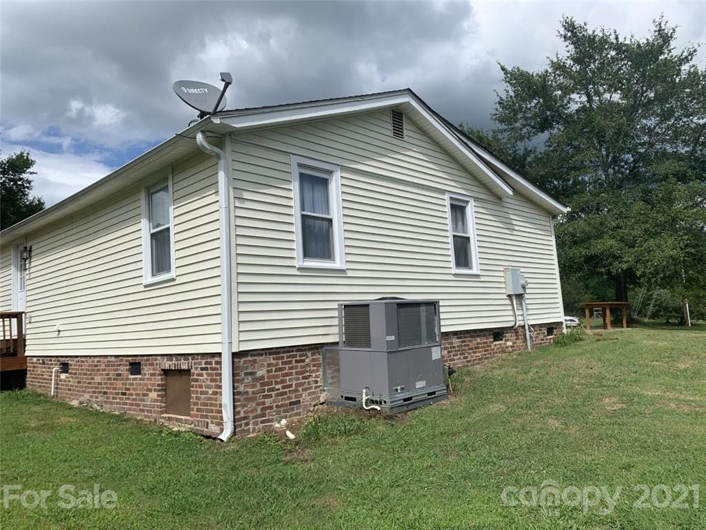 1822 Sharon Road York, SC 29745 - Photo 22 of 39 a front view of a house with a yard
