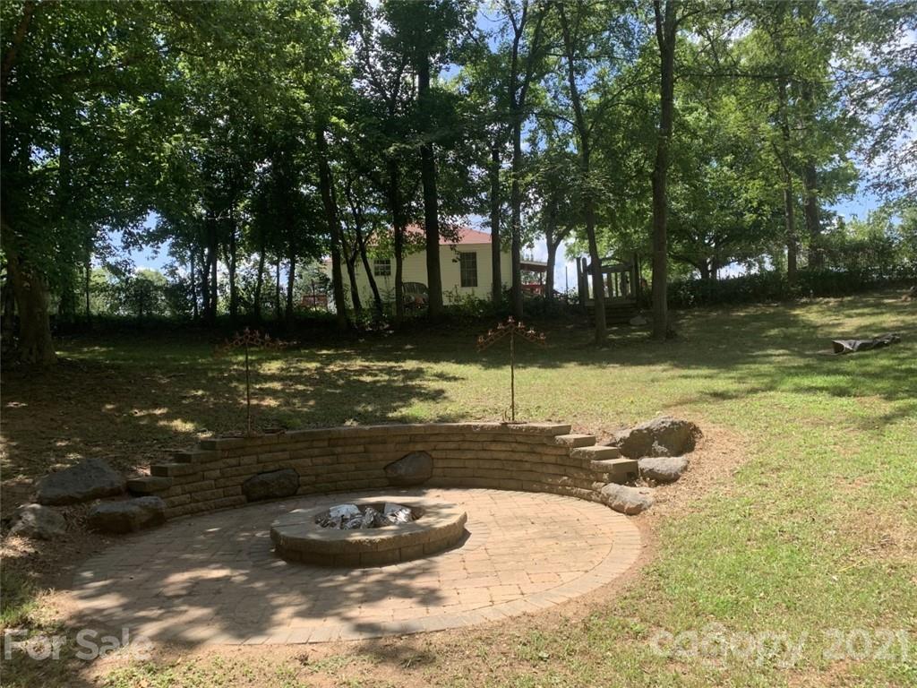 1822 Sharon Road York, SC 29745 - Photo 35 of 39 a view of a lake with a house