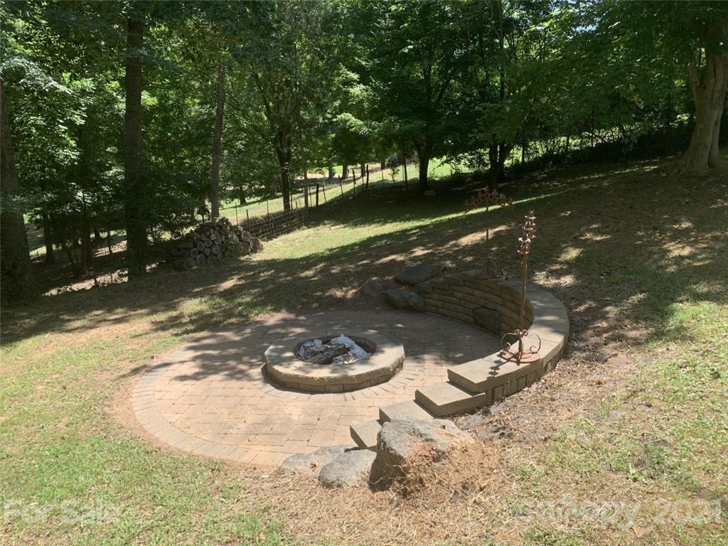 1822 Sharon Road York, SC 29745 - Photo 36 of 39 a view of a lake from a yard