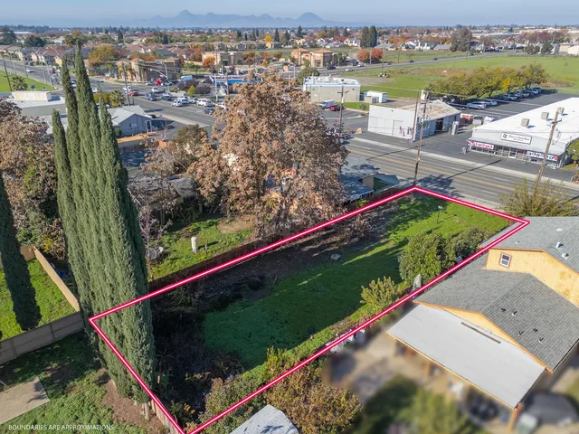 an outdoor space with wooden floor