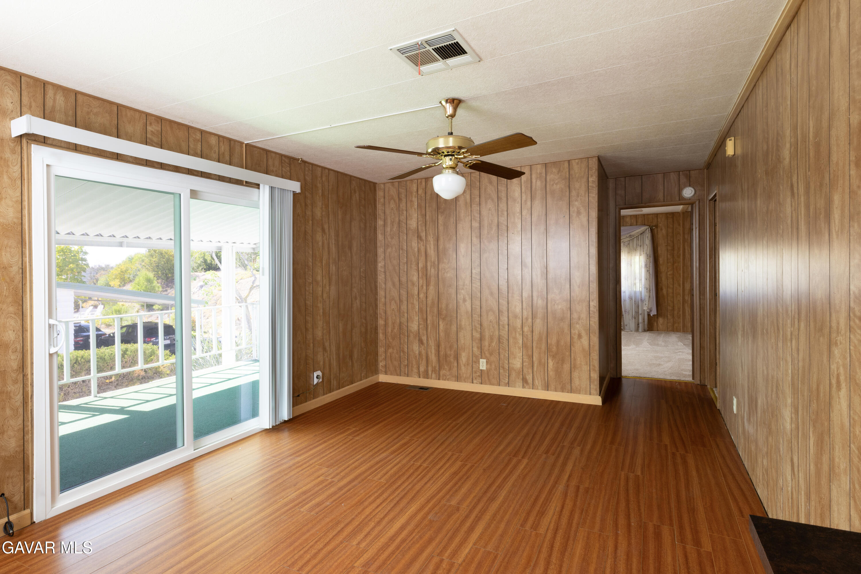 275 South Worthington Street Spring Valley, CA 91977 - Photo 13 of 30 wooden floor in an empty room with a window