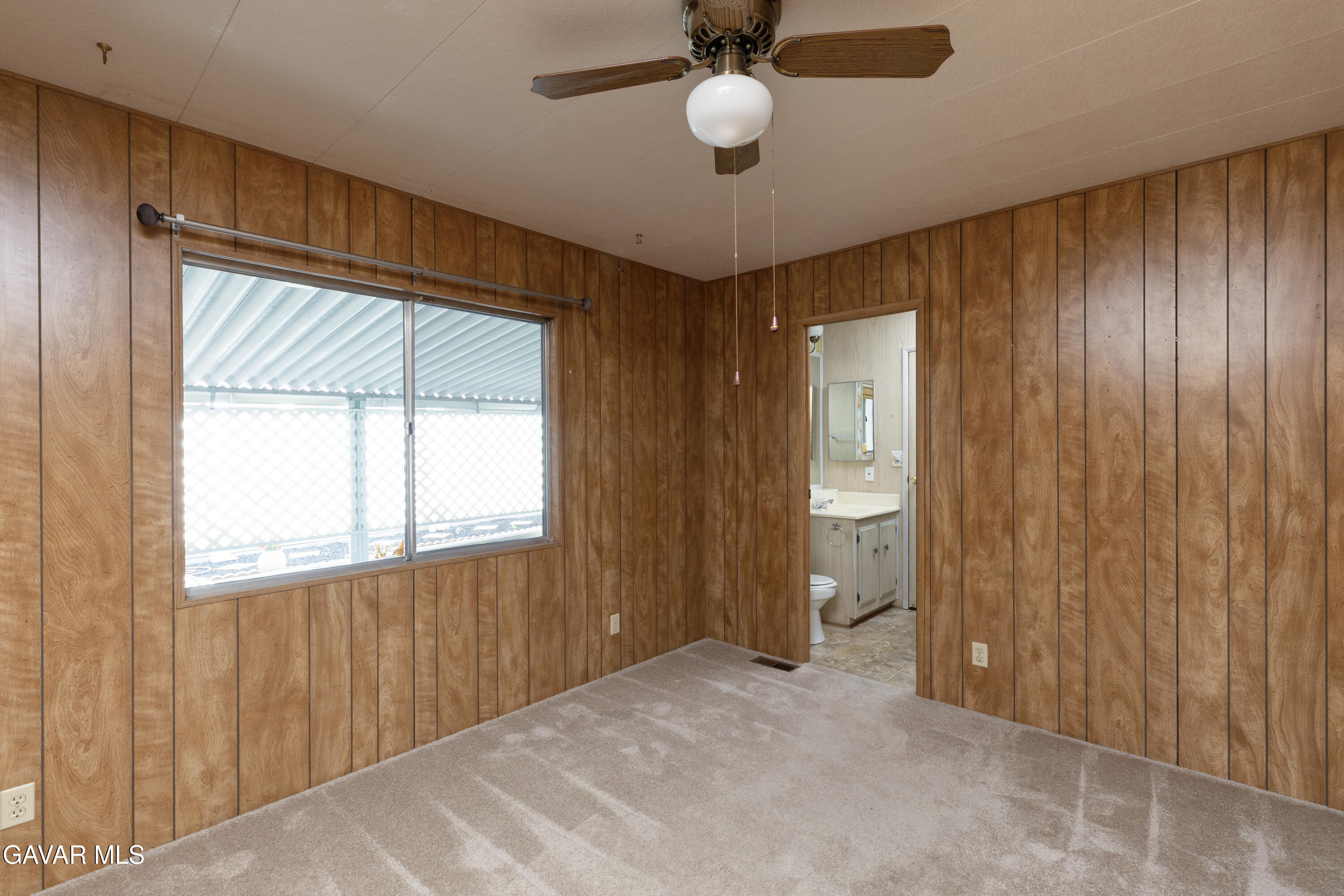 275 South Worthington Street Spring Valley, CA 91977 - Photo 15 of 30 a view of an empty room with a window and closet area