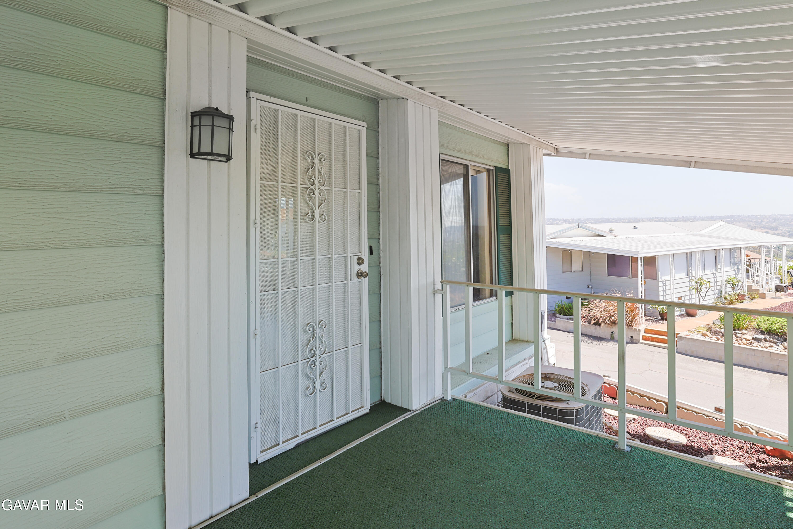 275 South Worthington Street Spring Valley, CA 91977 - Photo 23 of 30 a view of a porch with a table and chairs