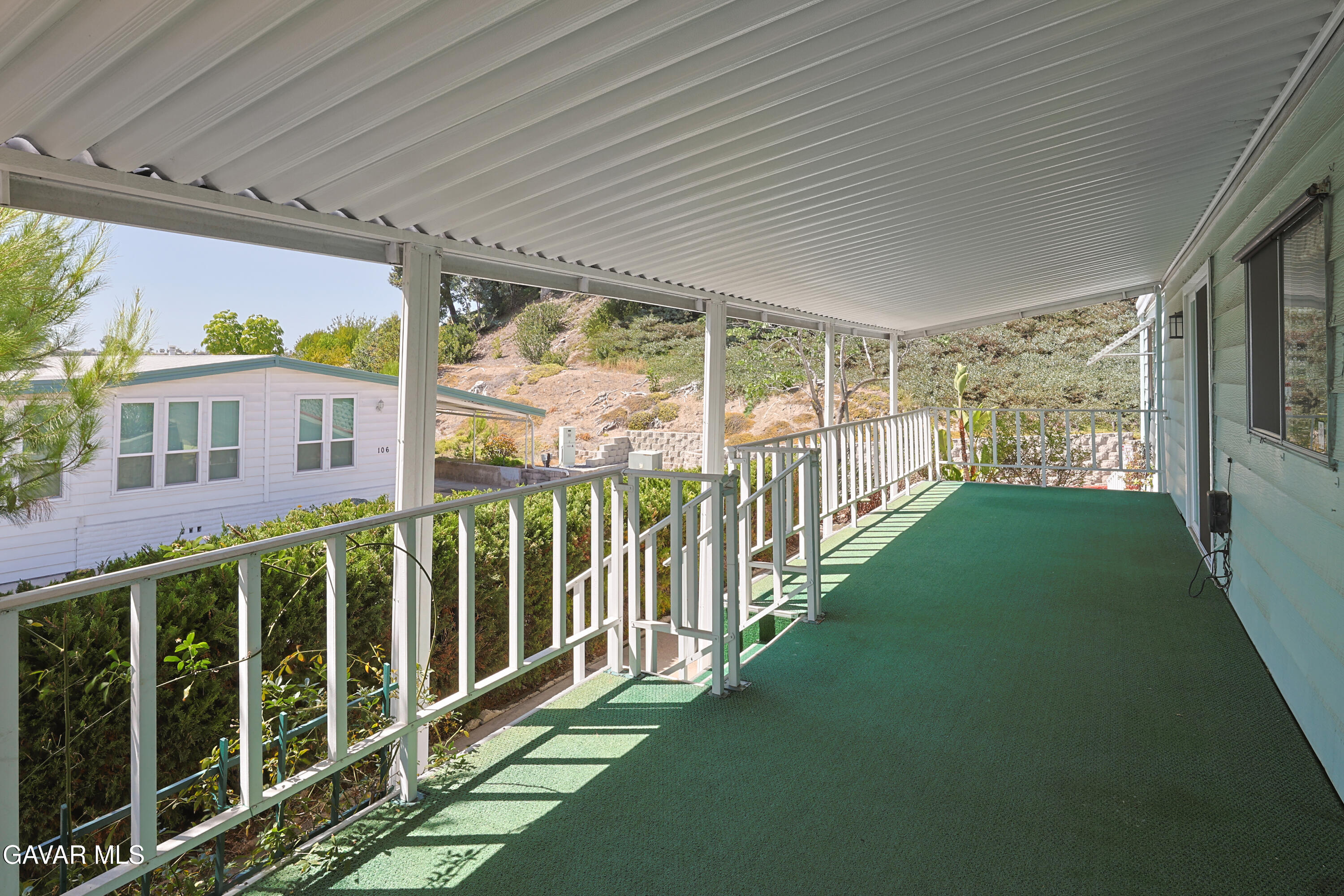 275 South Worthington Street Spring Valley, CA 91977 - Photo 24 of 30 a view of a porch with wooden floor and fence