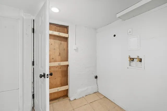 a view of a hallway with closet