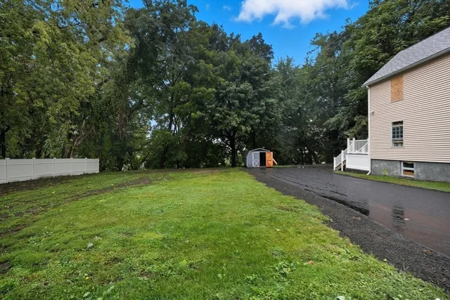 a view of a backyard with a garden