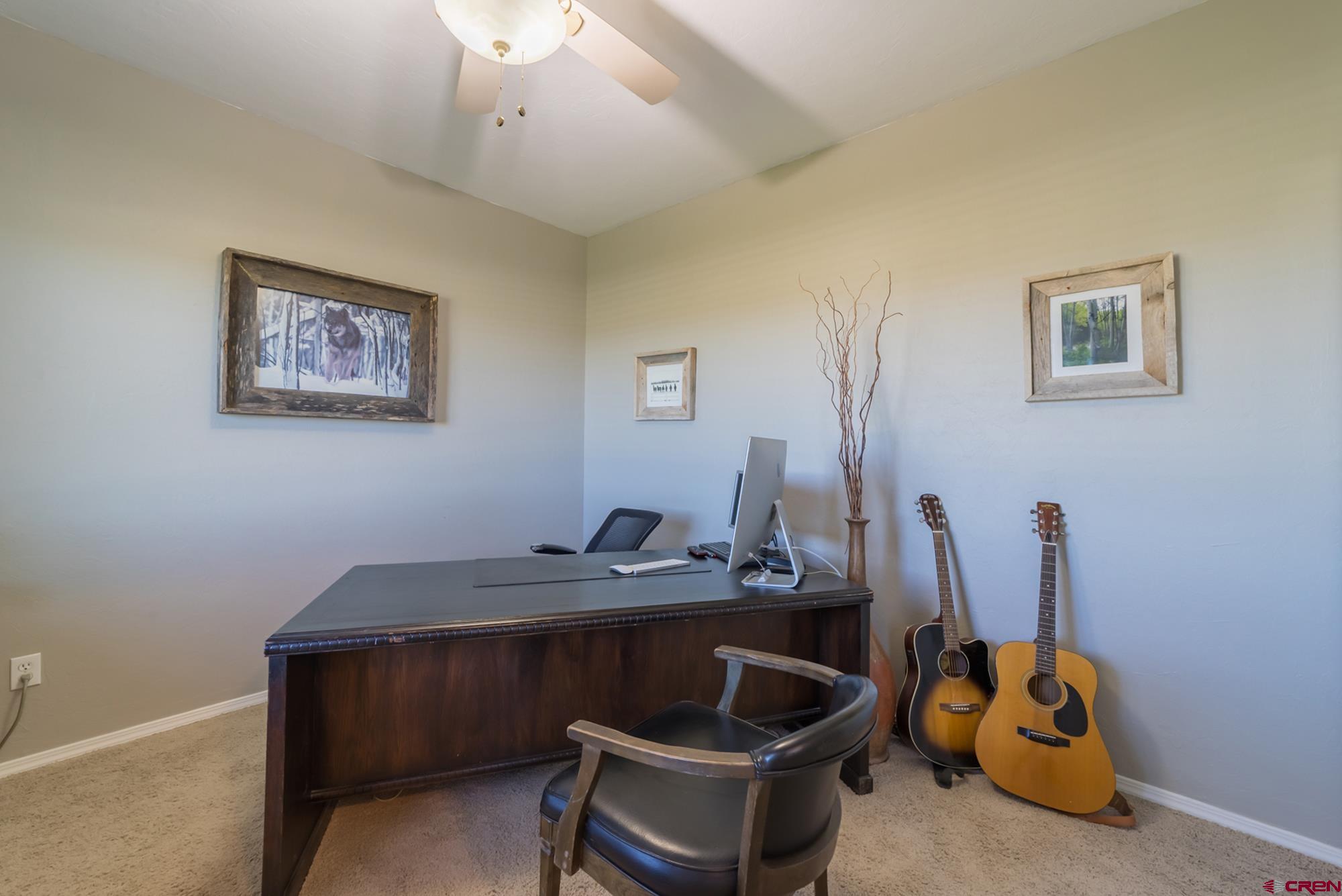 68041 Ute Vly Drive Montrose, CO 81403 - Photo 19 of 35 a view of a workspace with furniture