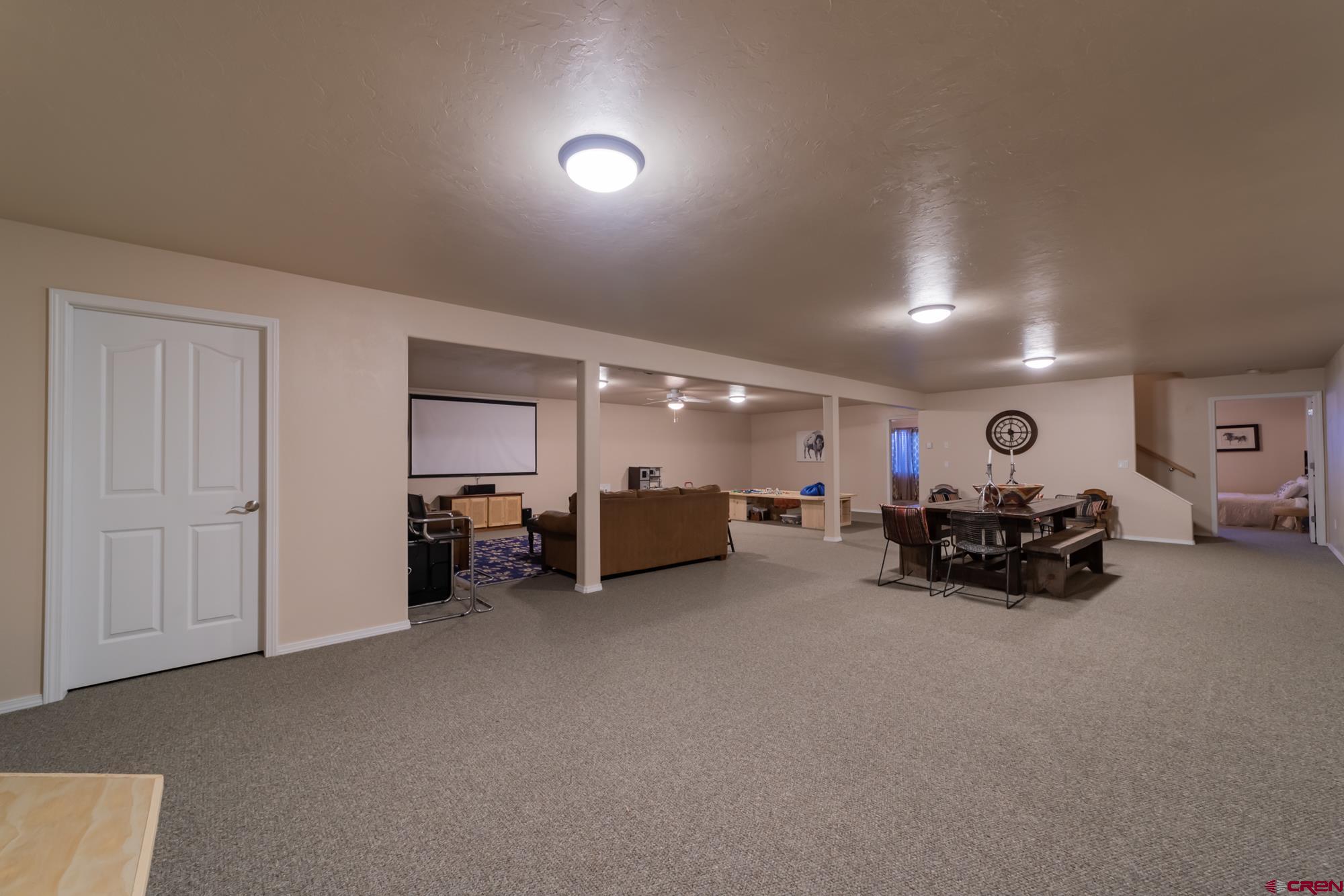 68041 Ute Vly Drive Montrose, CO 81403 - Photo 23 of 35 a living room with furniture and a gym machine