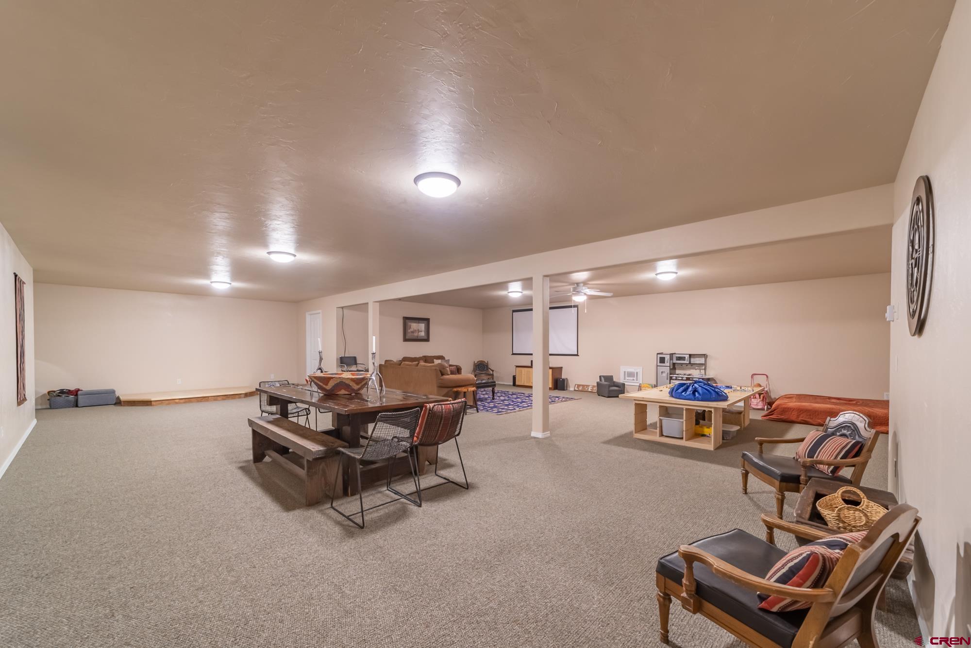 68041 Ute Vly Drive Montrose, CO 81403 - Photo 24 of 35 a living room with furniture