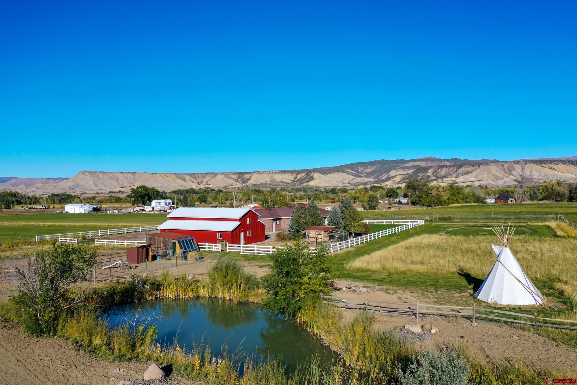 68041 Ute Vly Drive Montrose, CO 81403 - Photo 4 of 35 a view of lake with houses