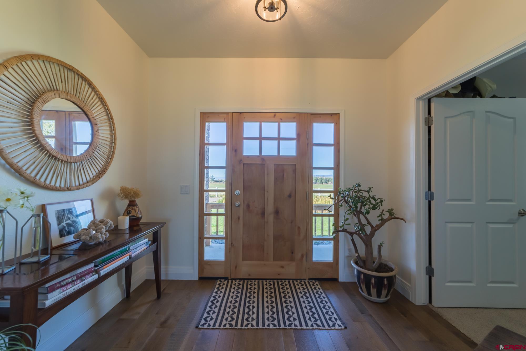 68041 Ute Vly Drive Montrose, CO 81403 - Photo 6 of 35 a room with painting and a table