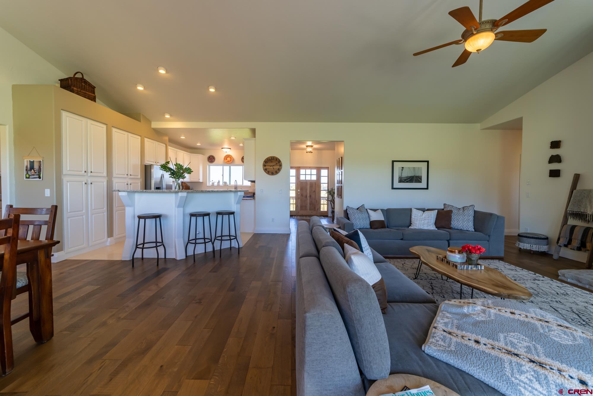 68041 Ute Vly Drive Montrose, CO 81403 - Photo 10 of 35 a dining room with furniture and wooden floor