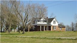 1004 Walnut Grove Road Christiana, TN 37037 - Photo 2 of 7 a front view of a house with a yard