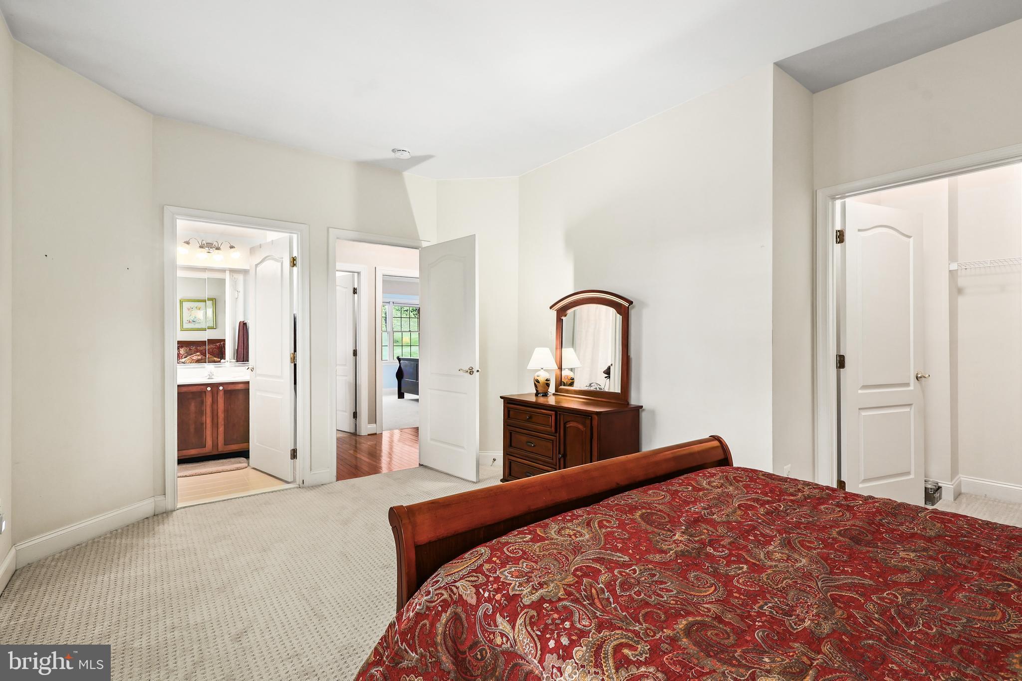 40890 Beechnut Road Leesburg, VA 20175 - Photo 40 of 65 a bedroom with a bed and a dresser