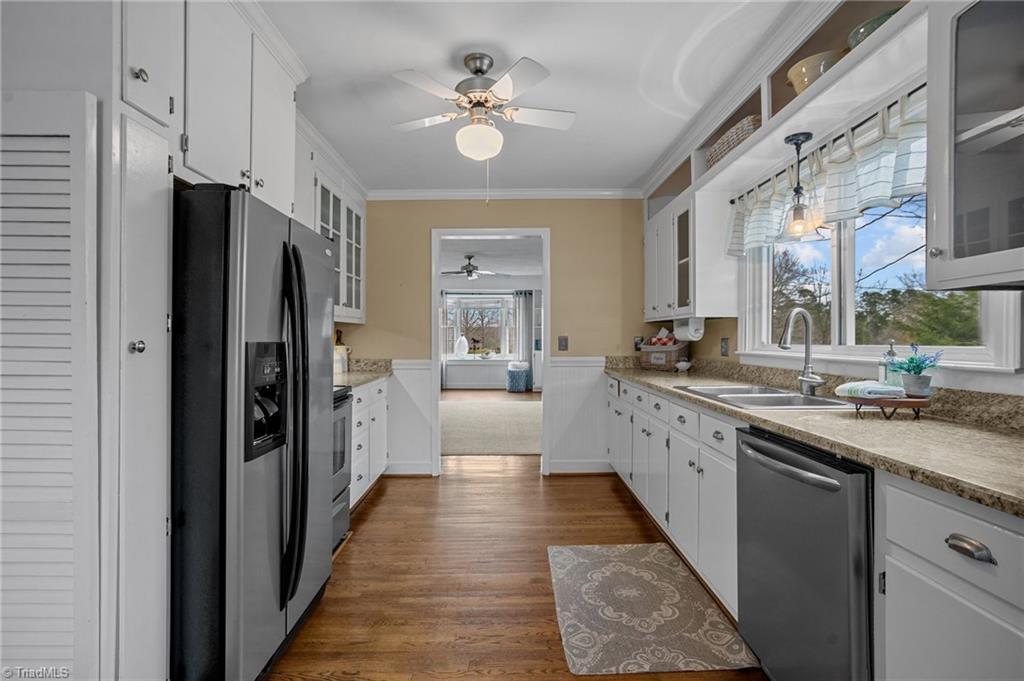 4818 Harvey Road Jamestown, NC 27282 - Photo 13 of 47 kitchen view from dining table