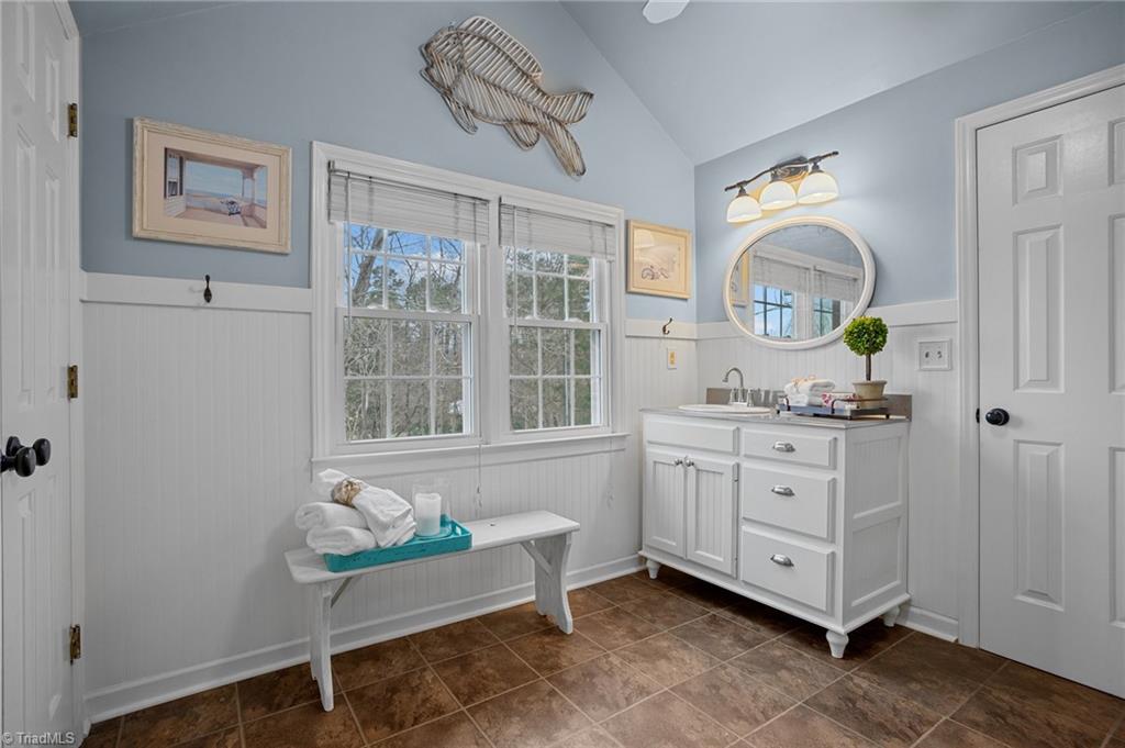 4818 Harvey Road Jamestown, NC 27282 - Photo 33 of 47 upstairs bath vanity with view of 2nd wall to wall walk in closet