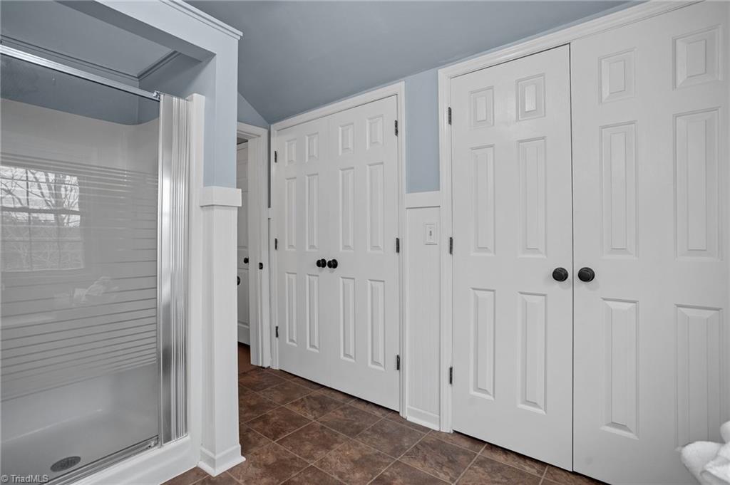 4818 Harvey Road Jamestown, NC 27282 - Photo 35 of 47 Upstairs bath with 1st wall to wall walk in closet