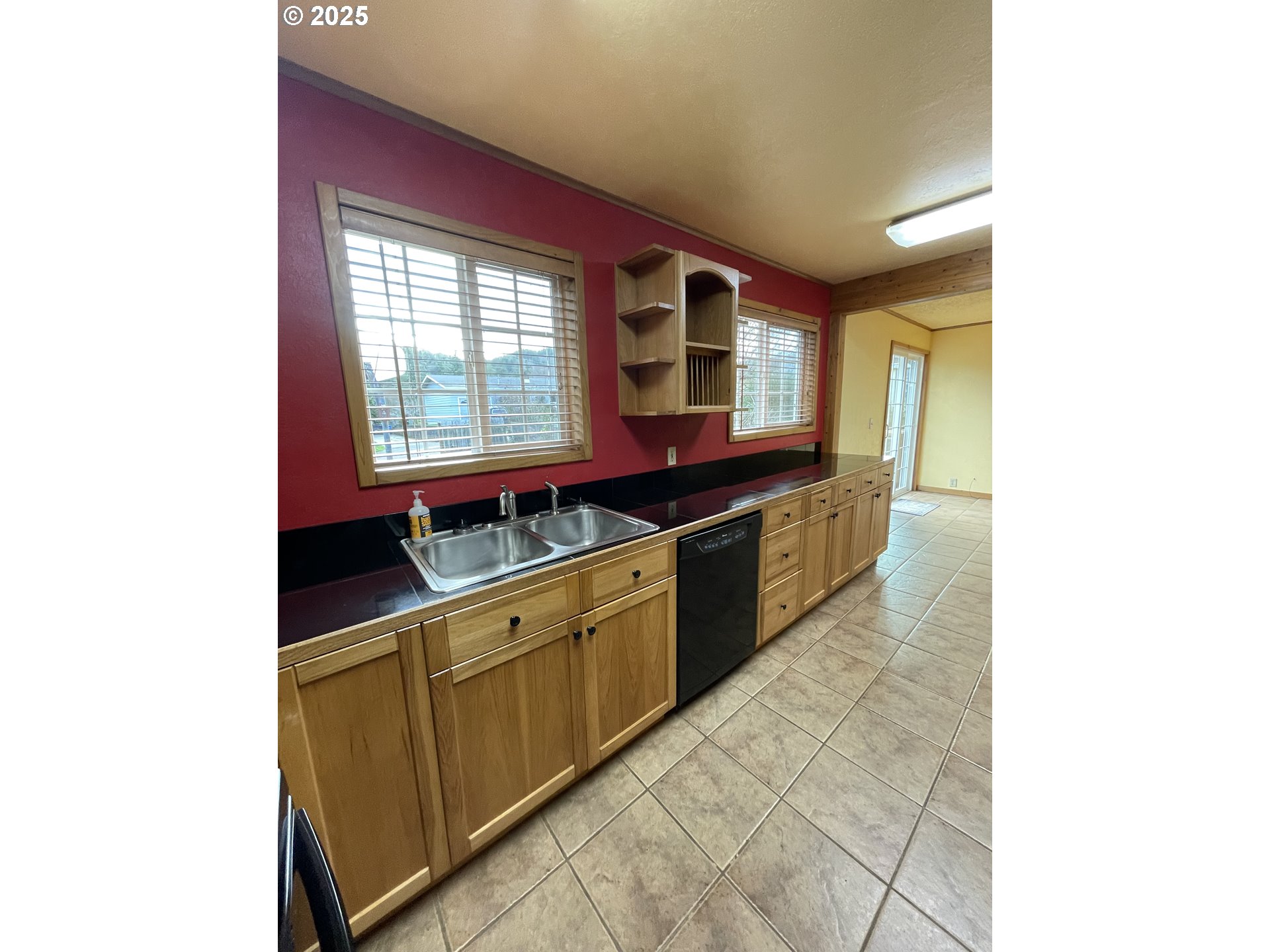 1820 Dogwood Avenue Reedsport, OR 97467 - Photo 12 of 29 a kitchen with a sink and cabinets