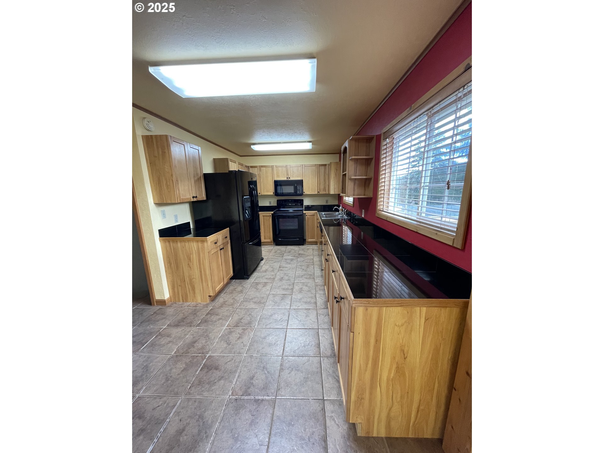 1820 Dogwood Avenue Reedsport, OR 97467 - Photo 13 of 29 a view of living room with furniture and a window