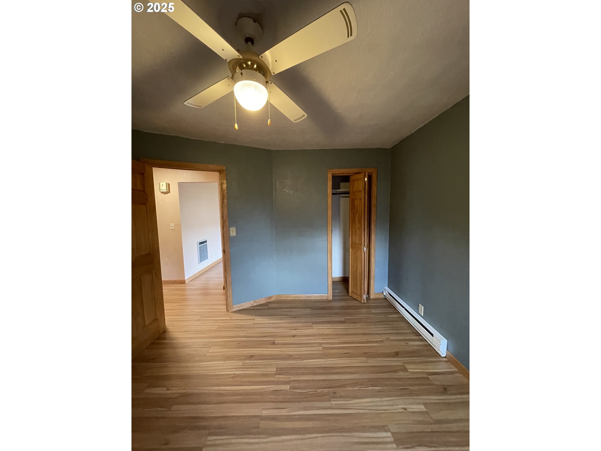 1820 Dogwood Avenue Reedsport, OR 97467 - Photo 7 of 29 a view of an empty room with wooden floor