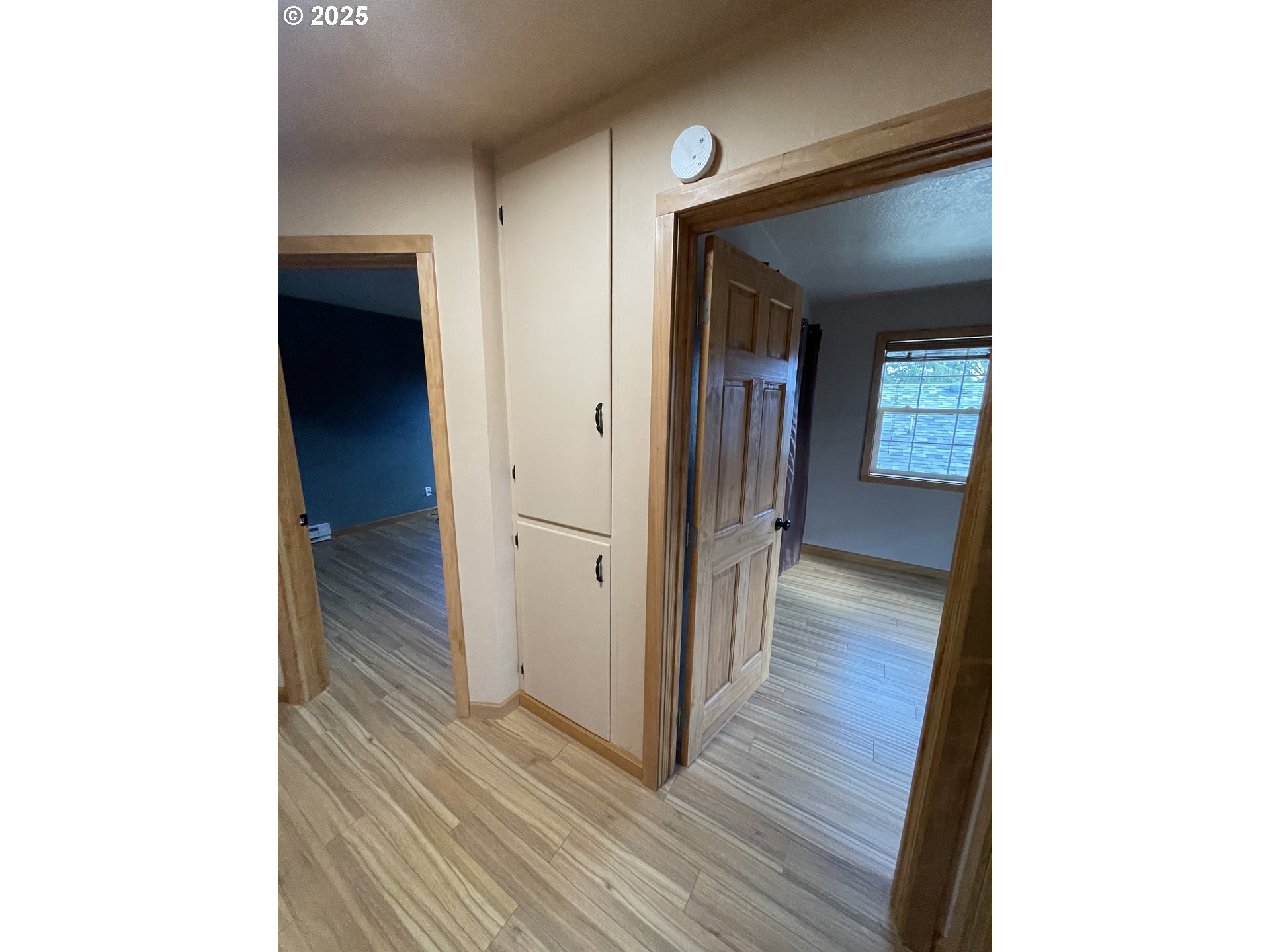 1820 Dogwood Avenue Reedsport, OR 97467 - Photo 8 of 29 a view of a hallway with wooden floor