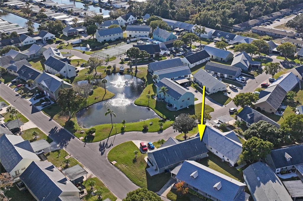 6709 Timbercove Lane, Unit 6709 New Port Richey, FL 34653 - Photo 33 of 52 an aerial view of residential houses with outdoor space