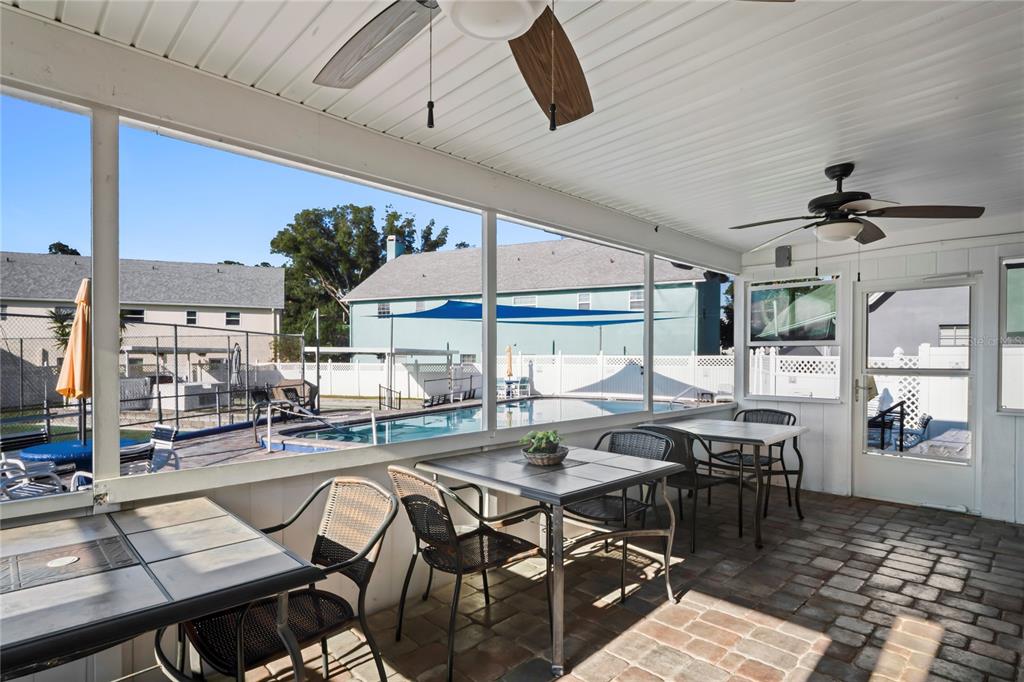 6709 Timbercove Lane, Unit 6709 New Port Richey, FL 34653 - Photo 47 of 52 a outdoor dining space with furniture