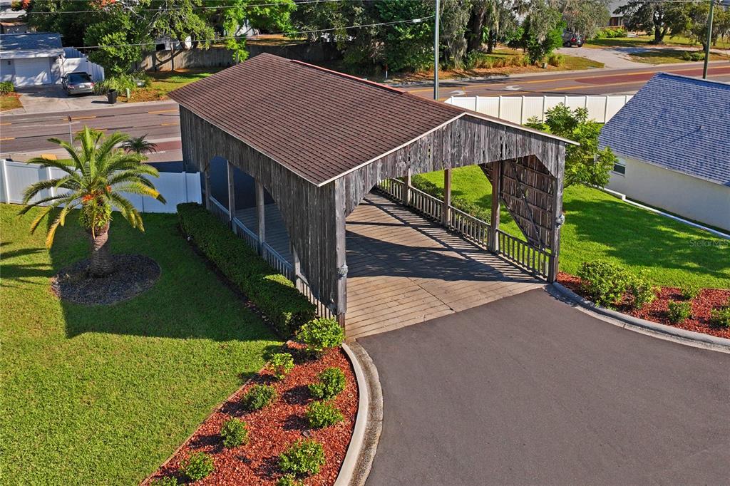 6709 Timbercove Lane, Unit 6709 New Port Richey, FL 34653 - Photo 50 of 52 a house view with a garden space