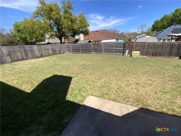 a view of swimming pool with a garden