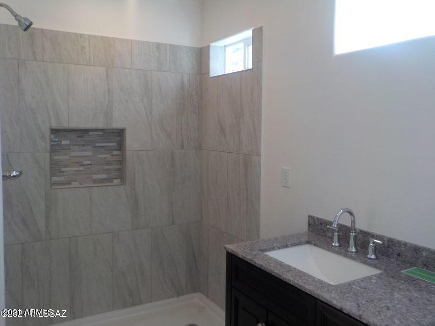 1842 Circulo Colombia Rio Rico, AZ 85648 - Photo 17 of 23 Ceramic Tile Surroundings