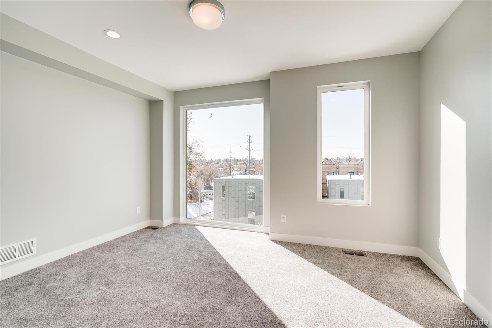 1237 Perry Street Denver, CO 80204 - Photo 19 of 37 a view of a room with window