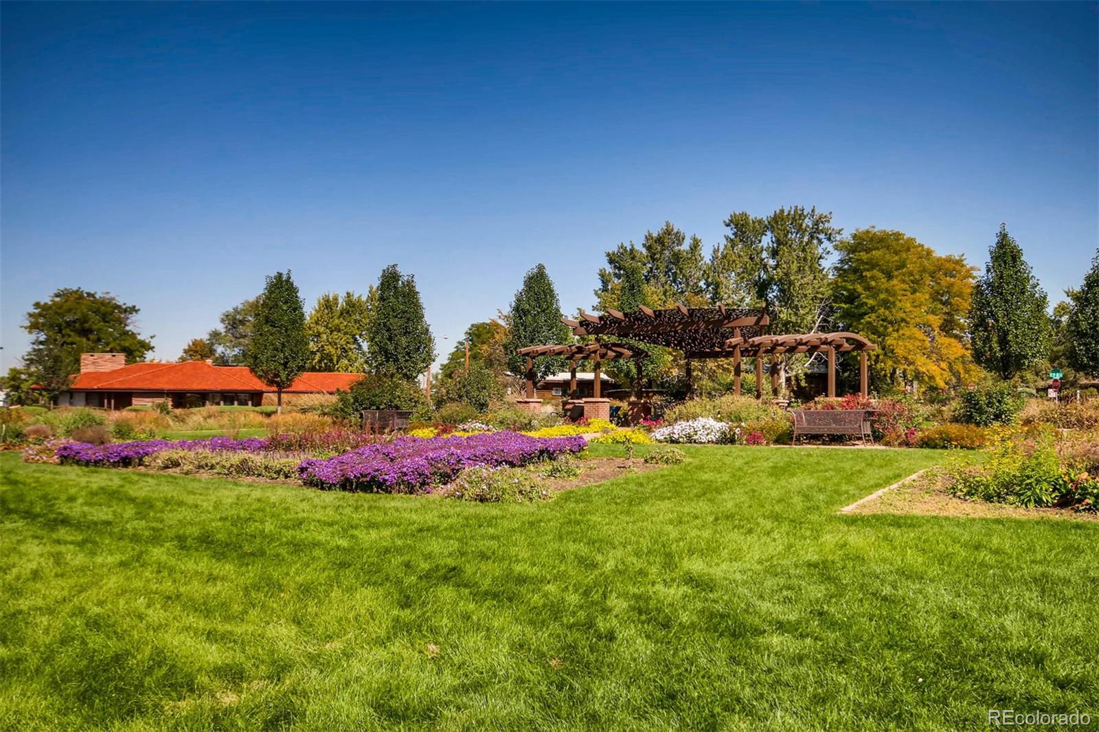 1237 Perry Street Denver, CO 80204 - Photo 29 of 37 a front view of a house with a yard