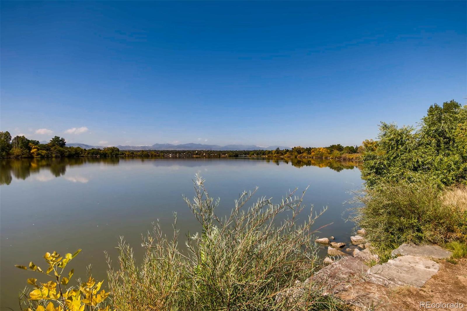 1237 Perry Street Denver, CO 80204 - Photo 30 of 37 a view of lake with green space