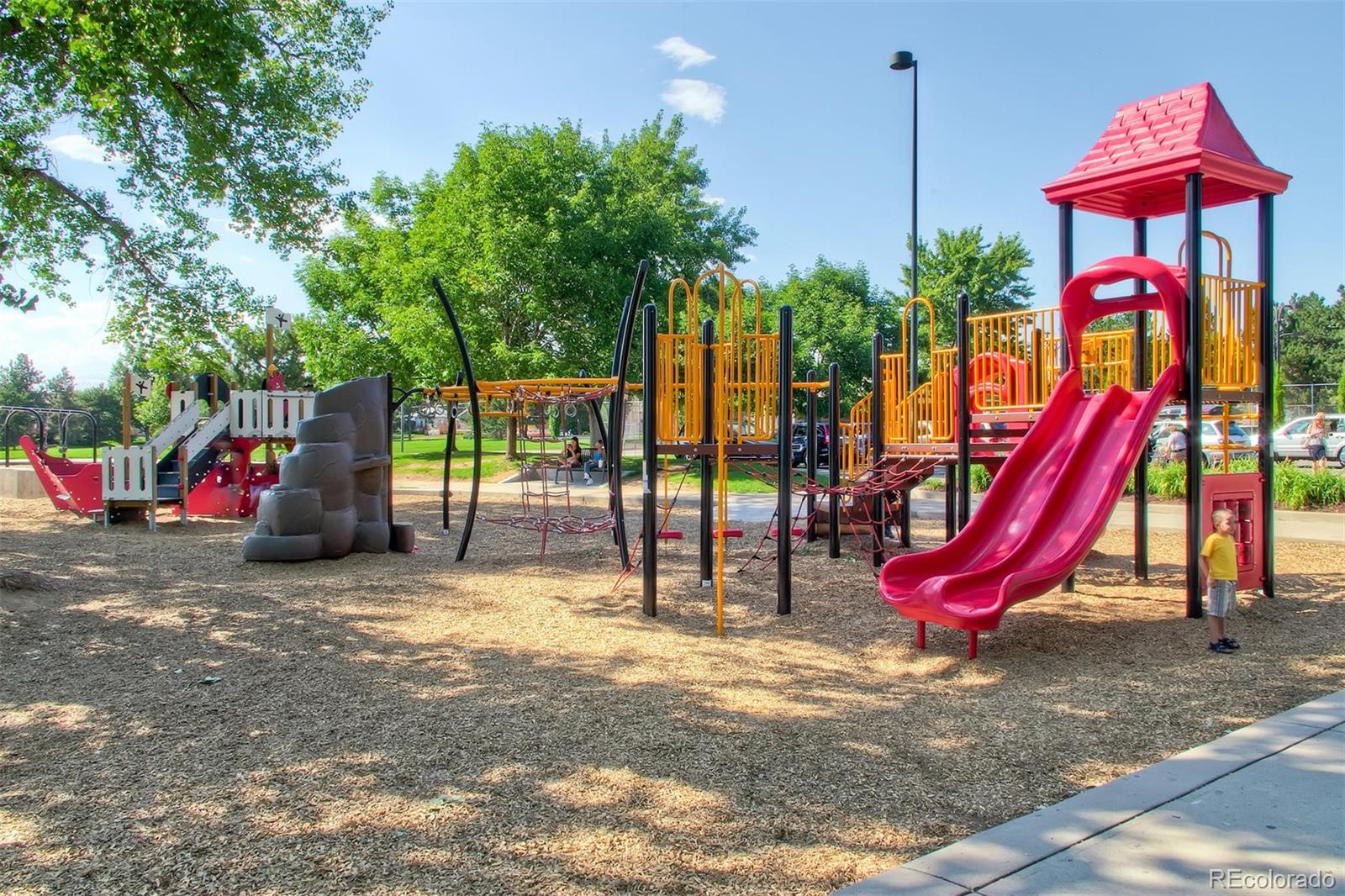 1237 Perry Street Denver, CO 80204 - Photo 33 of 37 a view of a park with slide and a slide