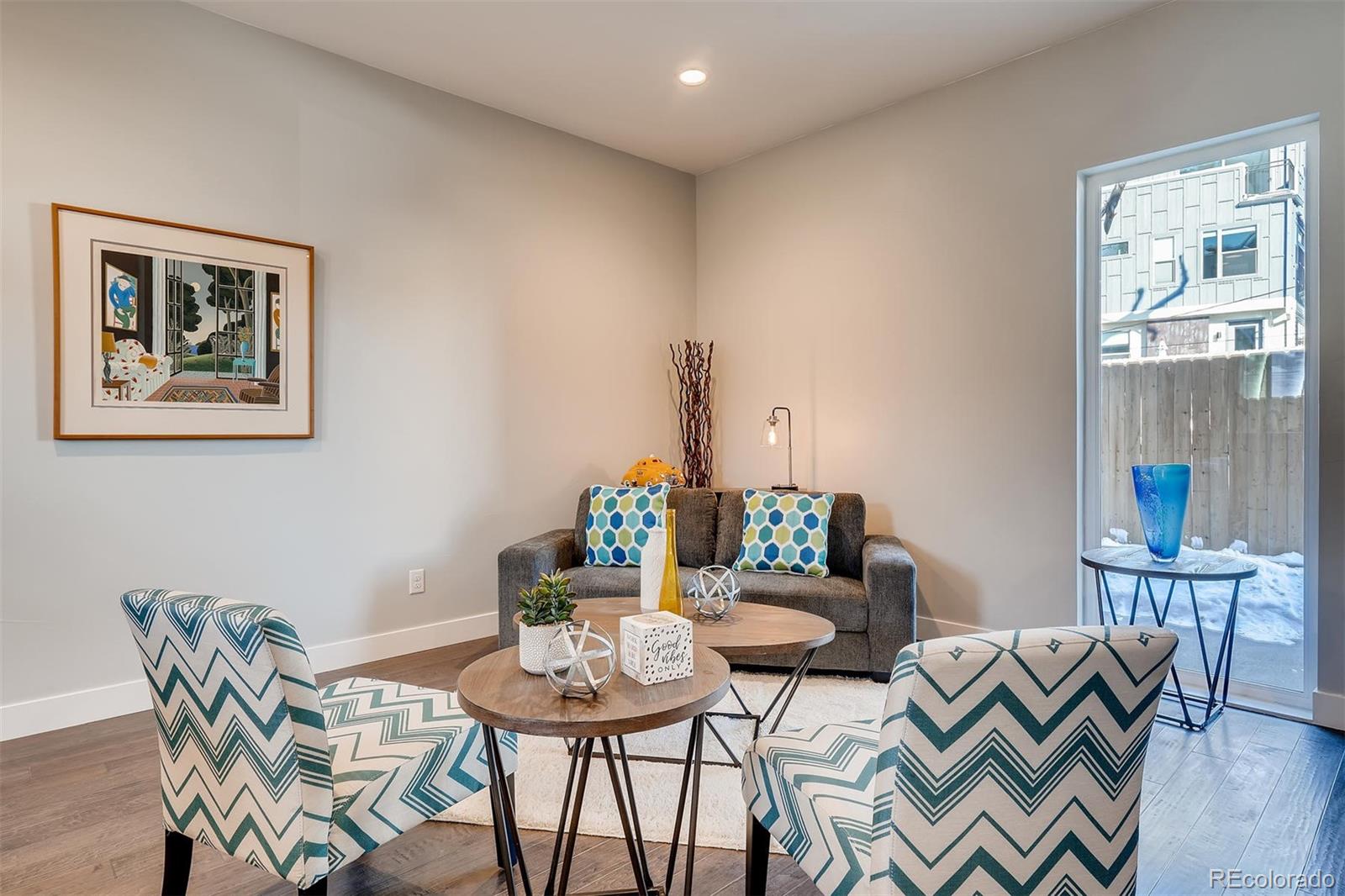 1237 Perry Street Denver, CO 80204 - Photo 5 of 37 a view of a dining room with furniture window and outdoor kitchen