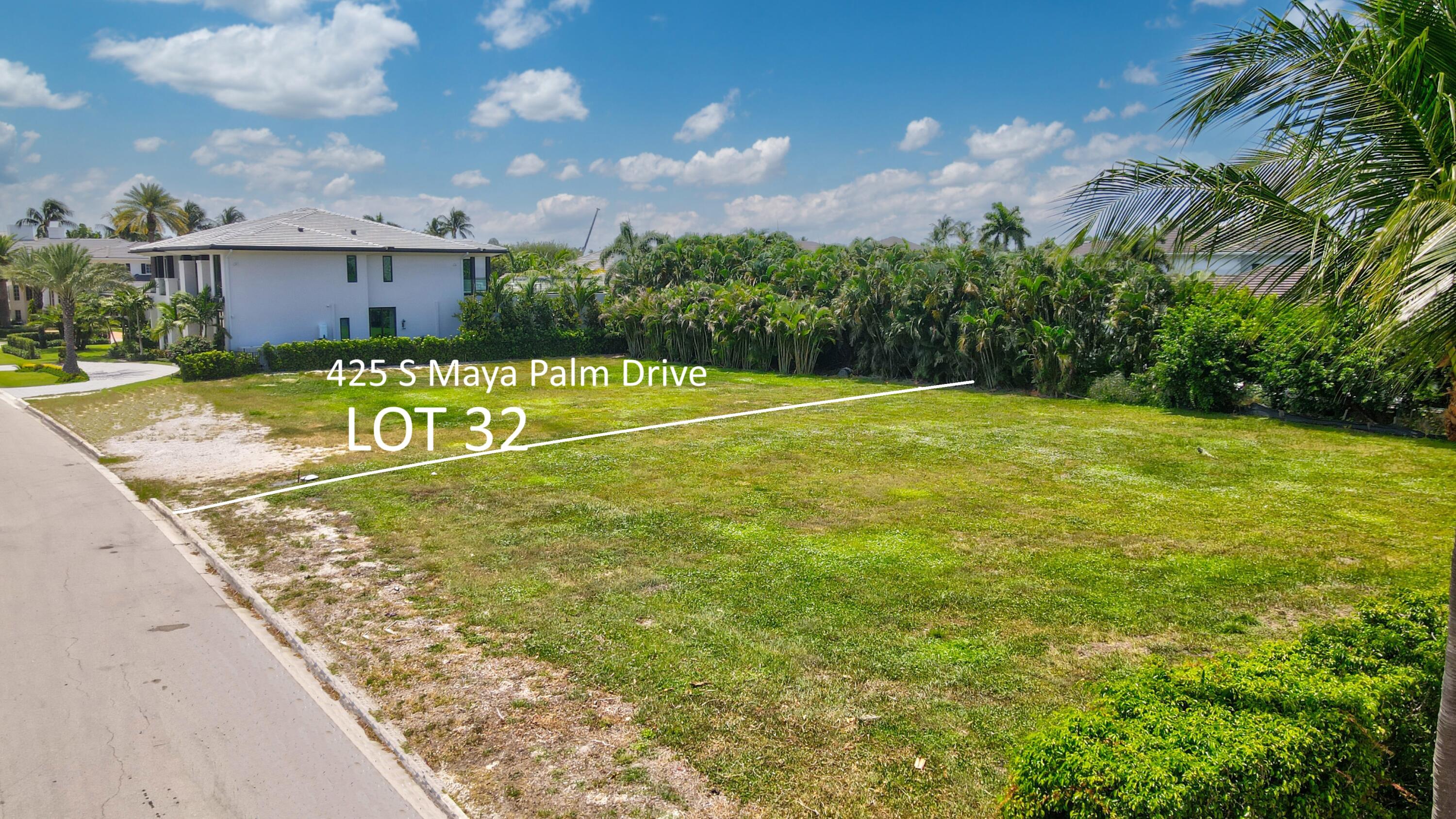 425 South Maya Palm Drive Boca Raton, FL 33432 - Photo 5 of 22 a view of a house with a yard and a large tree