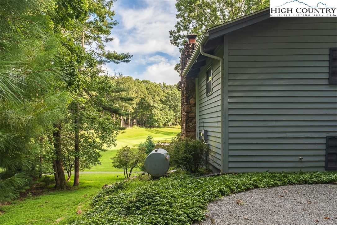 377 Deer Run Road Glade Valley, NC 28627 - Photo 3 of 26 a view of a back yard of the house