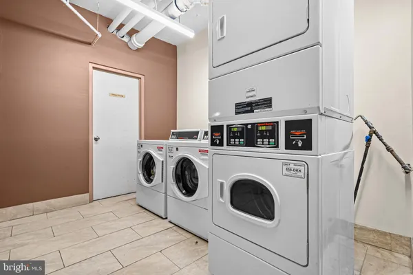 a view of washer and dryer in a utility room