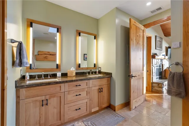a kitchen with lots of counter top space and dining table